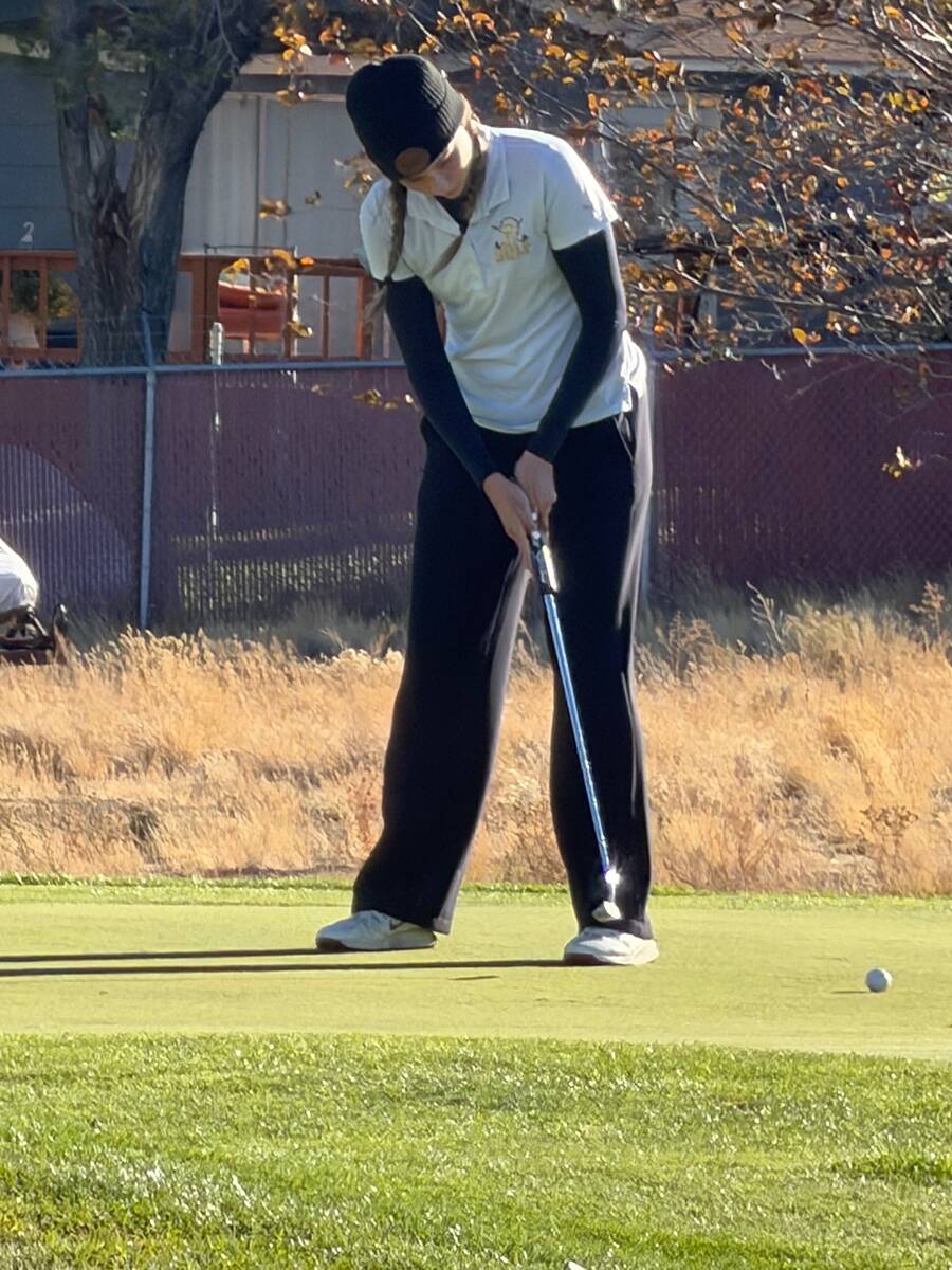 Pahrump Valley’s Raegan Saldana putts during the final round of the Class 3A state girls golf ...