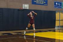 Pahrump Valley’s Riley Saldana prepares to serve during the Trojans’ Sept. 1 match at Bould ...