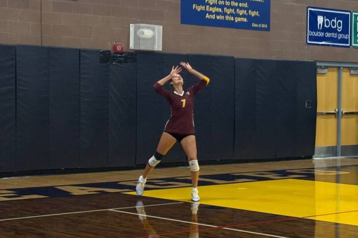 Pahrump Valley’s Riley Saldana prepares to serve during the Trojans’ Sept. 1 match at Bould ...