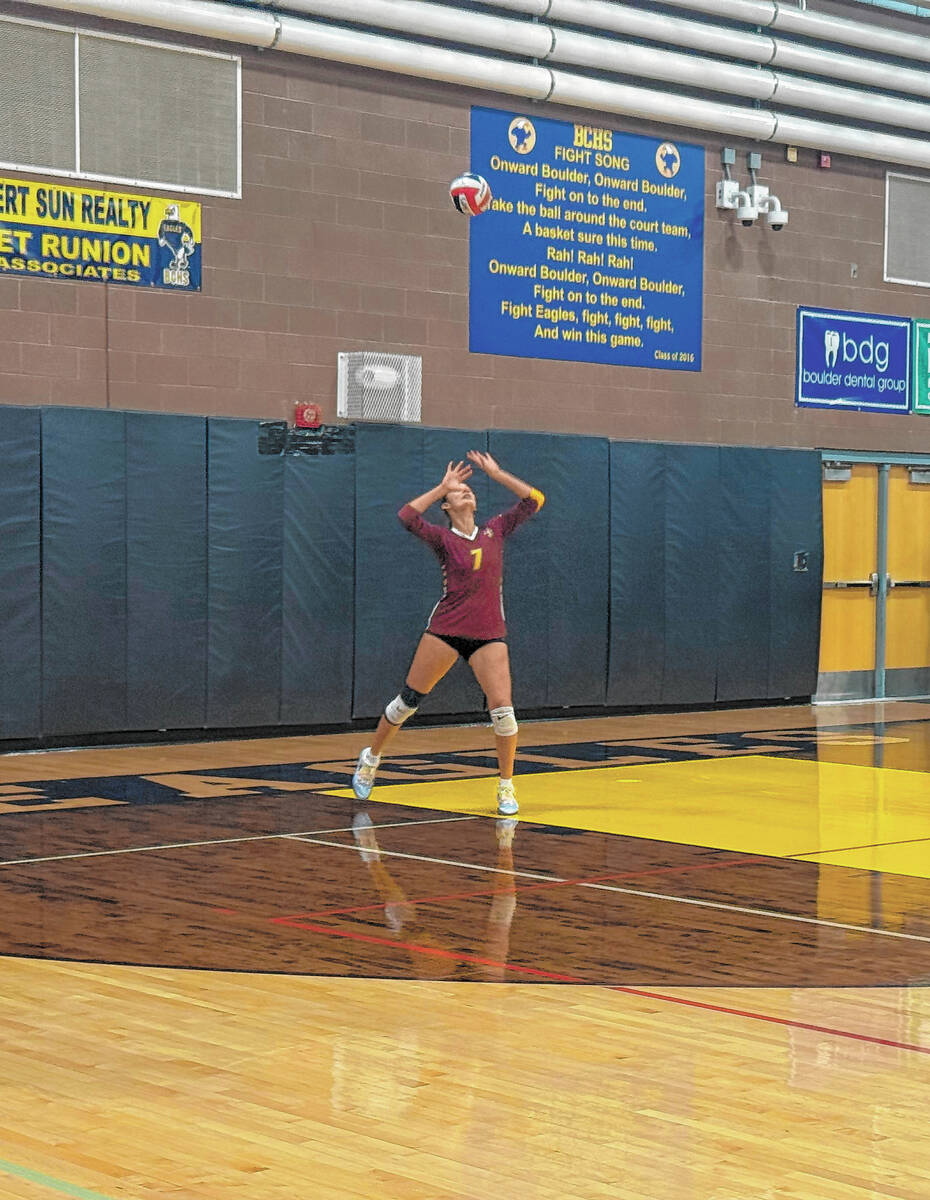 Pahrump Valley’s Riley Saldana prepares to serve during the Trojans’ Sept. 1 match at Bould ...