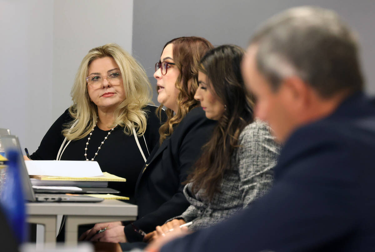 Attorney Thoma Donaldson, right, the special counsel to the commission, suspended Pahrump Justi ...