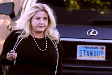 Suspended Pahrump Justice of the Peace Michele Fiore arrives at the State Bar of Nevada buildin ...