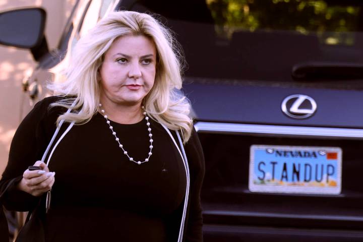 Suspended Pahrump Justice of the Peace Michele Fiore arrives at the State Bar of Nevada buildin ...