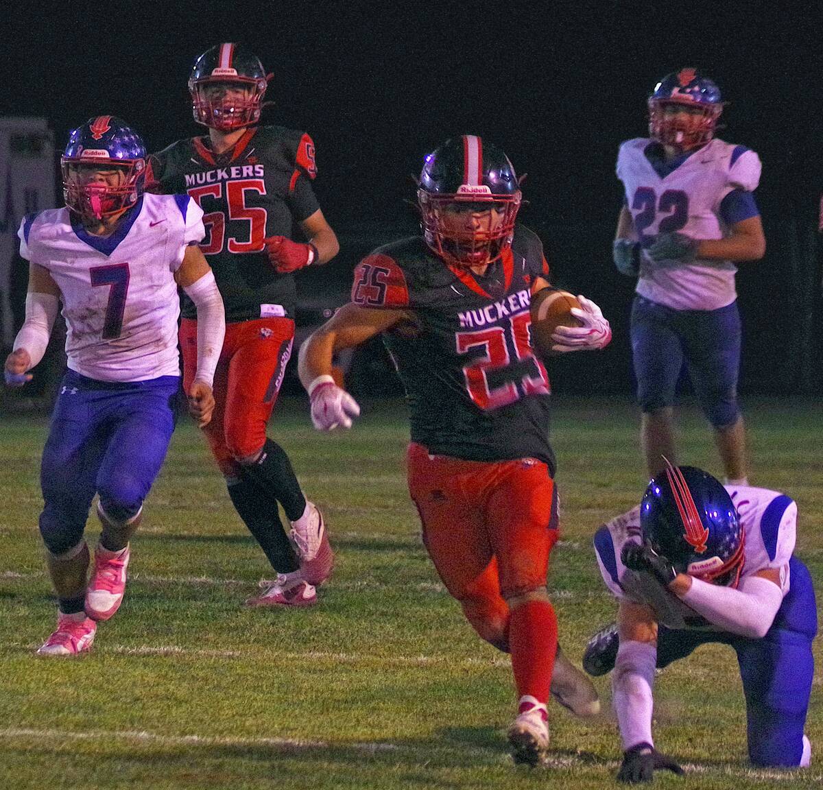 Tonopah quarterback Dustin Otteson (25) breaks into the open field during the Muckers’ 64-8 v ...