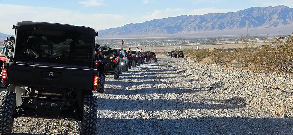 A long line of side-by-sides takes to the trails around Pahrump for the all new route featured ...