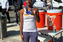 Pahrump Valley senior Chanel Anthony displays her third-place medal at the Class 3A state tenni ...