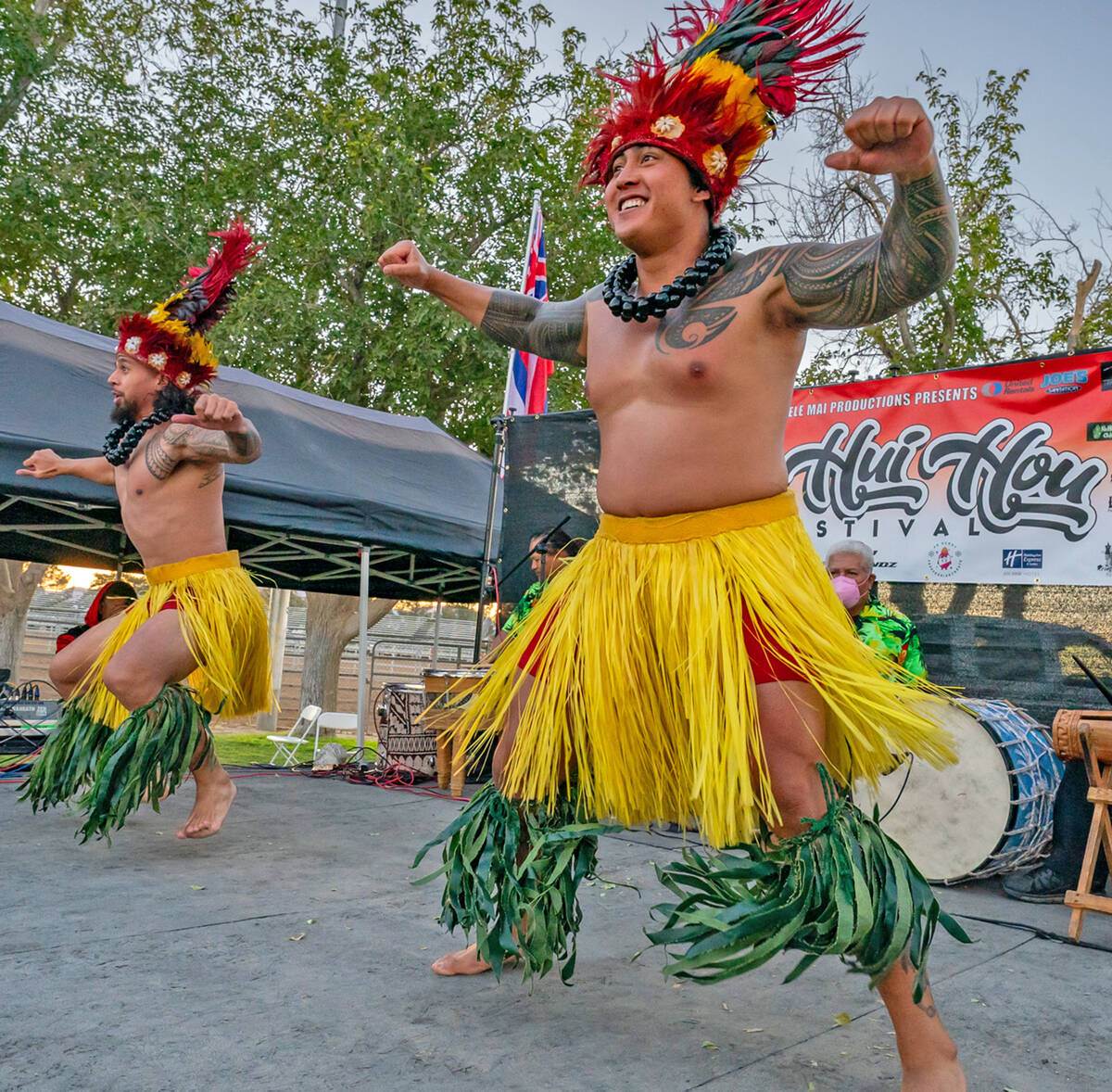 Garbed in island dress, dancers entertain the audience at a Hui Hou Festival, which will be com ...