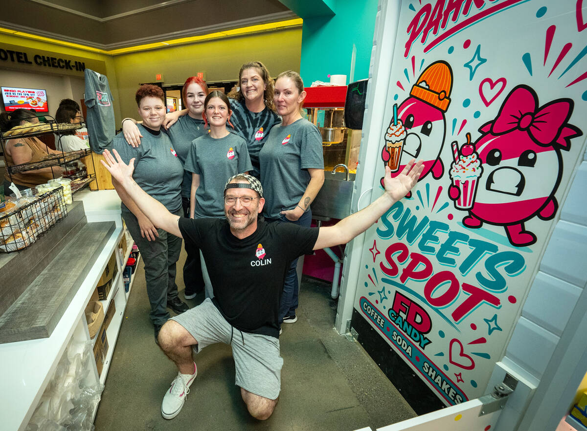 The team behind FD Candy, led by owners Colin McCarthy, kneeling, and Tay McCarthy, right, cele ...