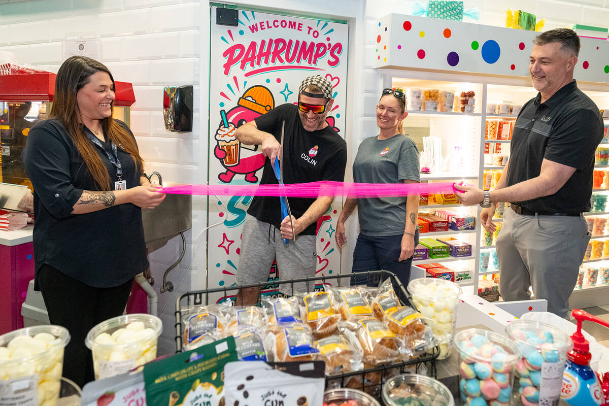 Husband and wife team Colin and Tay McCarthy, center, were delighted to host a grand opening an ...