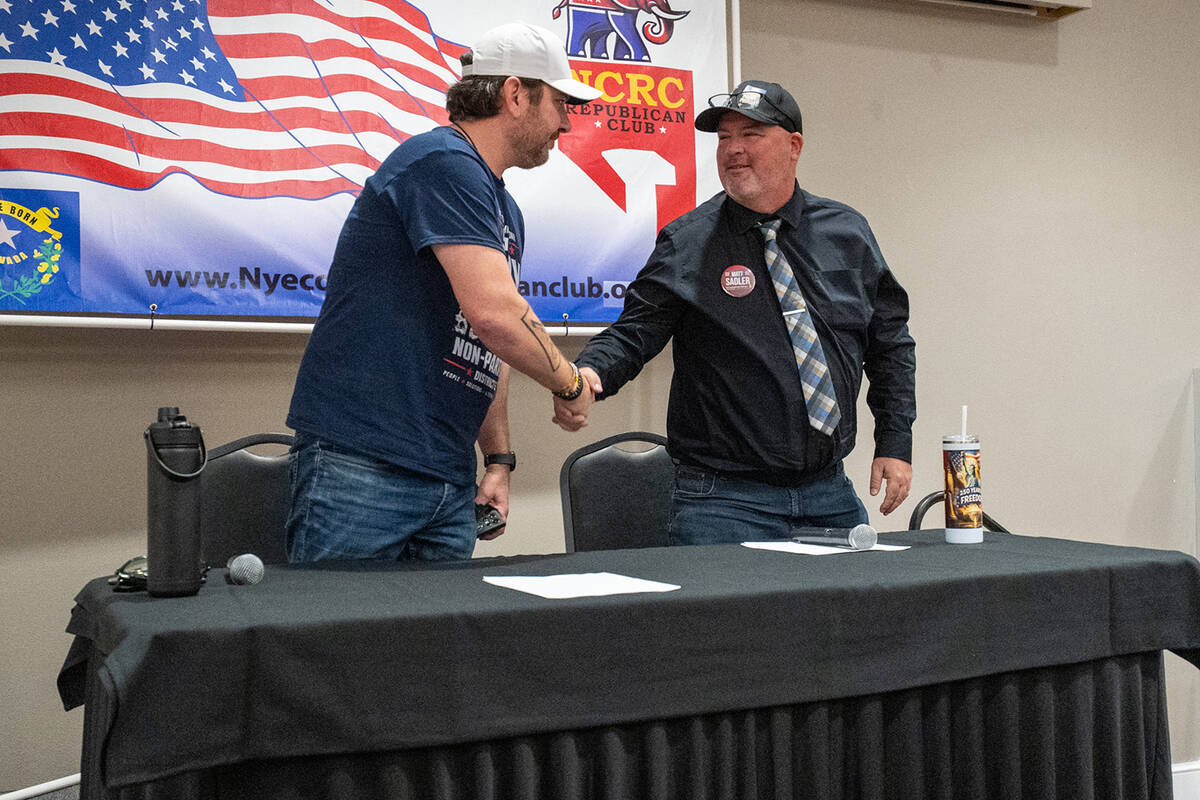 Nonpartisan District 5 commissioner candidate Chris Lally (left) and Republican nominee for Dis ...