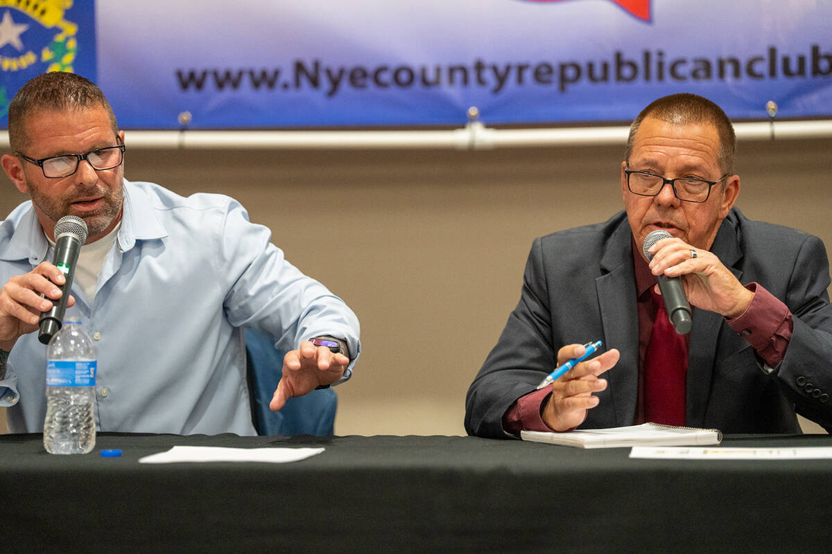 Sheriff challenger Dan Pineau (left) and incumbent Sheriff Joe McGill (right) at the Nye County ...